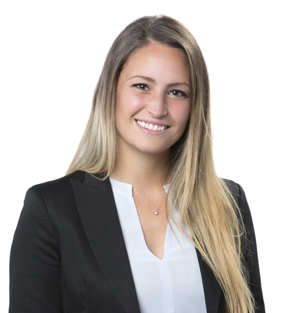 Portrait of a smiling woman in business attire for SEO.