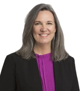 Lisa Blaha smiling in a professional headshot for Corridor Title.