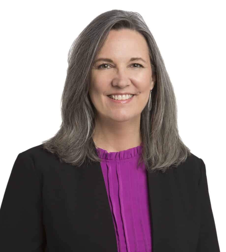 Lisa Blaha smiling in a professional headshot for Corridor Title.