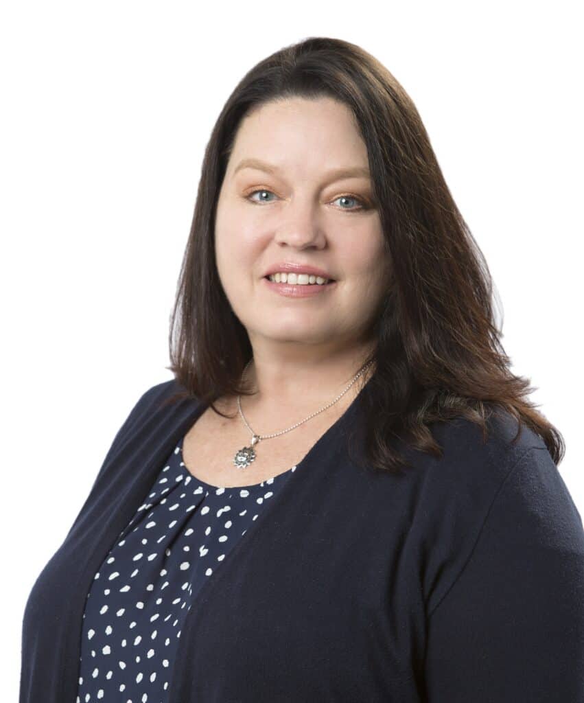 Professional portrait of Shannon Davis for real estate branding.